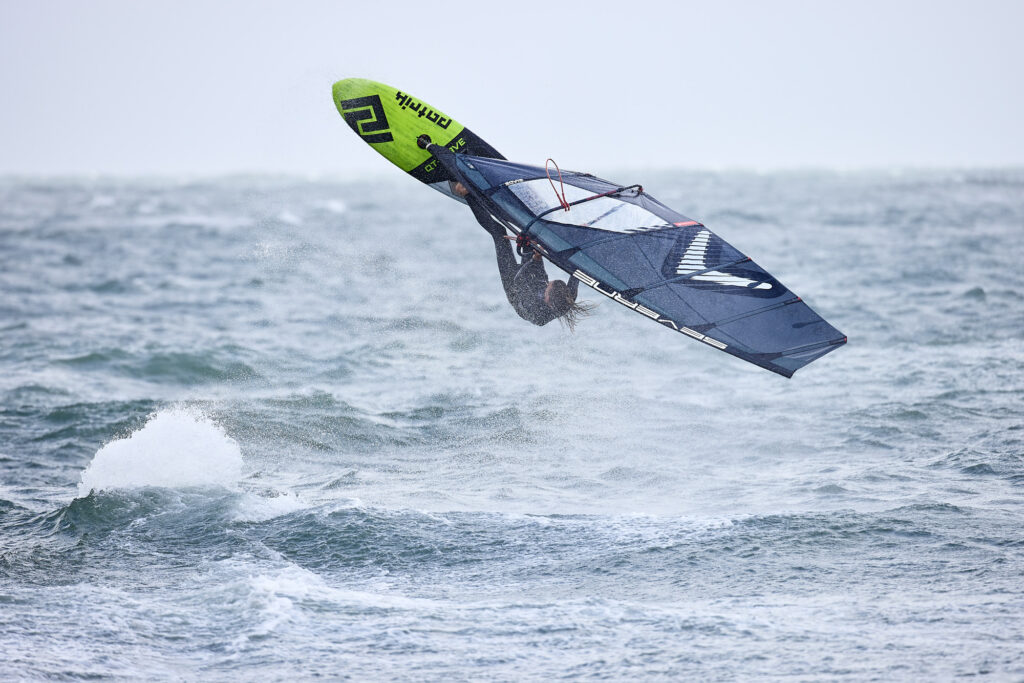 windsurfer jumping and making a backflip